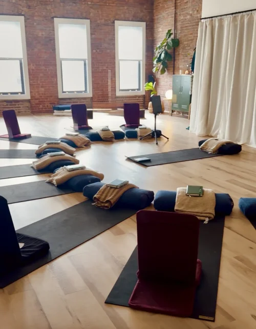 An intimate Listening Room gathering prepared for reflection and guided stillness
